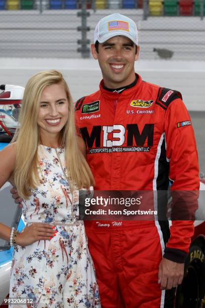 Timmy Hill, driver of the VSI Racing Toyota and wife Lucy before the start of the Coca-Cola Firecracker 250 race on July 6 at Daytona International...