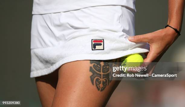 Close-up of the tattoo on the leg of Karolina Pliskova during her victory over Mihaela Buzarnescu in their Ladies' Singles Third Round match at All...