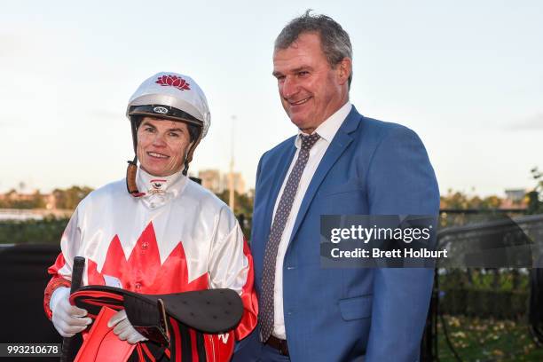 Craig Williams with Darren Weir after the Seppelt Wines Victorian Sprint Series Final at Flemington Racecourse on July 07, 2018 in Flemington,...