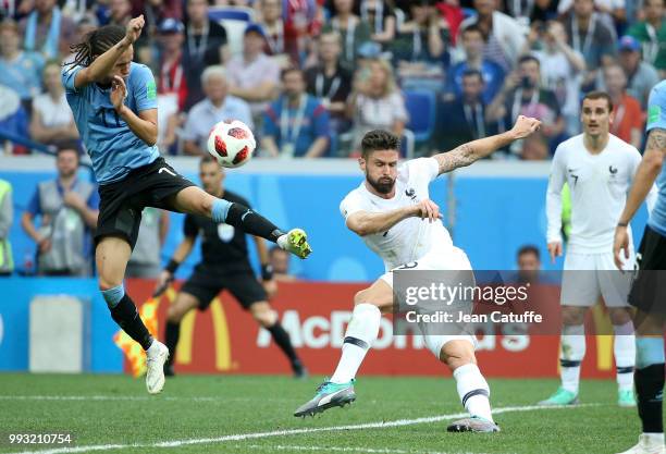 Olivier Giroud of France, Diego Laxalt of Uruguay during the 2018 FIFA World Cup Russia Quarter Final match between Uruguay and France at Nizhny...