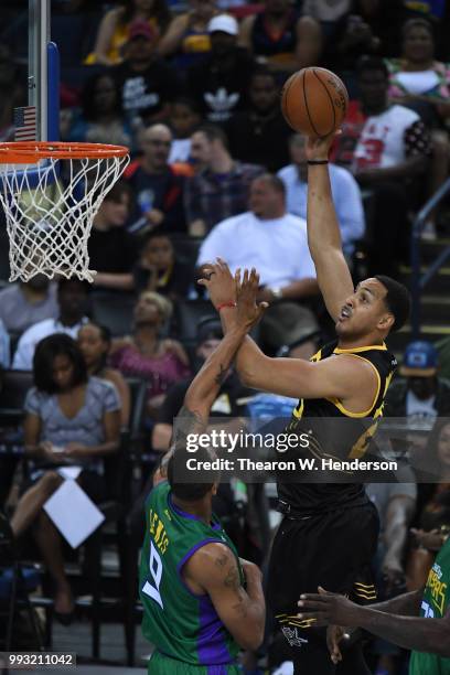 Ryan Hollins of Killer 3s throws up a shot against Rashard Lewis of 3 Headed Monsters during week three of the BIG3 three on three basketball league...