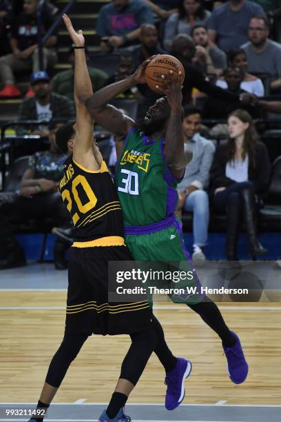 Reggie Evans of 3 Headed Monsters throws up a shot against Ryan Hollins of Killer 3s during week three of the BIG3 three on three basketball league...