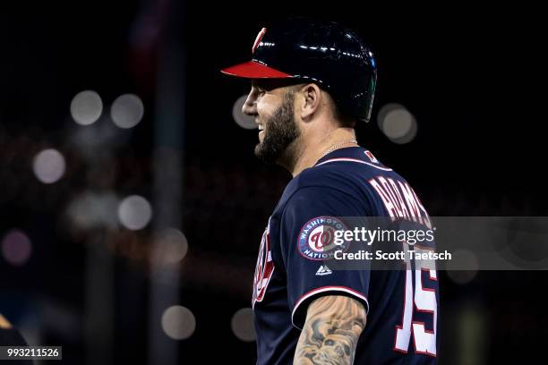 Matt Adams of the Washington Nationals reacts after hitting a single to load the bases against the Miami Marlins during the eighth inning at...