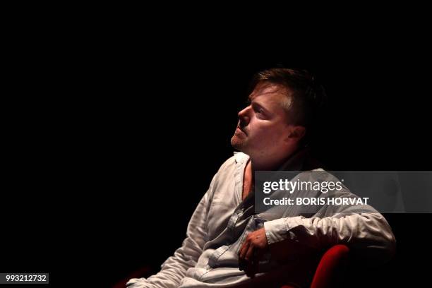 Swiss theater director Milo Rau is pictured before the play "La Reprise" directed by Milo Rau in Avignon on July 6 during the 72nd International...