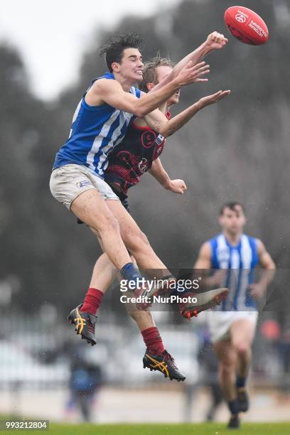 Josh Williams of North Melbourne leaps for the ball during the VFL round 14 game between the Casey Demons and North Melbourne at Casey Fields in...