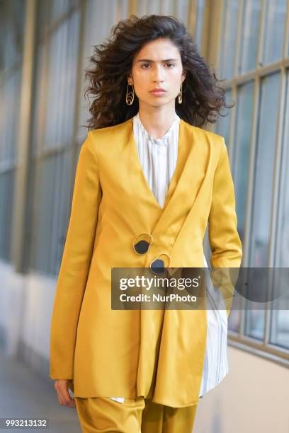 Model walks the runway during Angel Schlesser fashion show as part of the Mercedes Benz Fashion Week Madrid Spring/ Summer 2019 at the Jardin...