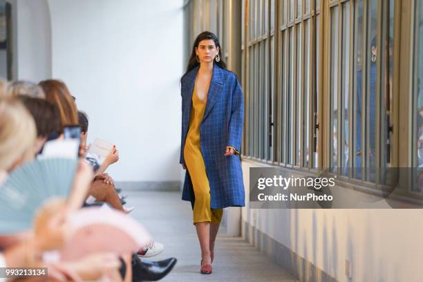 Model walks the runway during Angel Schlesser fashion show as part of the Mercedes Benz Fashion Week Madrid Spring/ Summer 2019 at the Jardin...