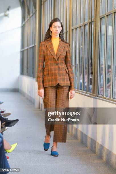 Model walks the runway during Angel Schlesser fashion show as part of the Mercedes Benz Fashion Week Madrid Spring/ Summer 2019 at the Jardin...