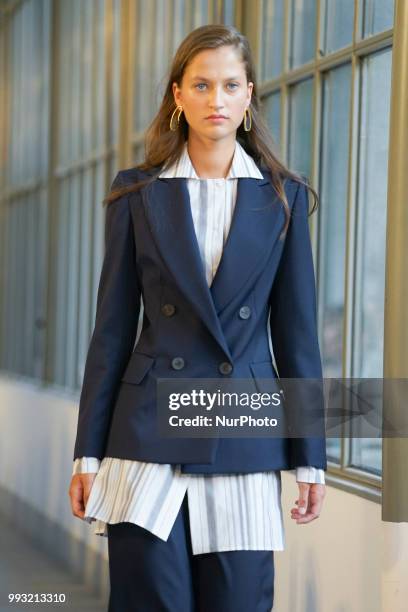 Model walks the runway during Angel Schlesser fashion show as part of the Mercedes Benz Fashion Week Madrid Spring/ Summer 2019 at the Jardin...