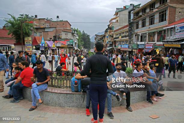 Tourists visit street market of Manali town, Himachal Pradesh , India on 6th July,2018.Manali is a resort town nestled in the mountains of the Indian...