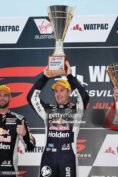 Jamie Whincup driver of the Red Bull Holden Racing Team Holden Commodore ZB celebrates after winning race 17 for the Supercars Townsville 400 on July...