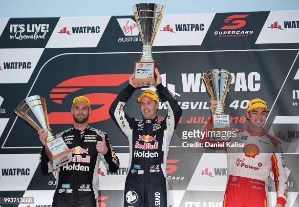 2nd place Shane Van Gisbergen driver of the Red Bull Holden Racing Team Holden Commodore ZB, 1st place Jamie Whincup driver of the Red Bull Holden...