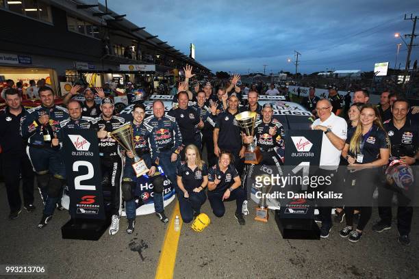 2nd place Shane Van Gisbergen driver of the Red Bull Holden Racing Team Holden Commodore ZB and 1st place Jamie Whincup driver of the Red Bull Holden...