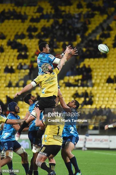 Blade Thomson of the Hurricanes and Jerome Kaino of the Blues during the round 18 Super Rugby match between the Hurricanes and the Blues at Westpac...