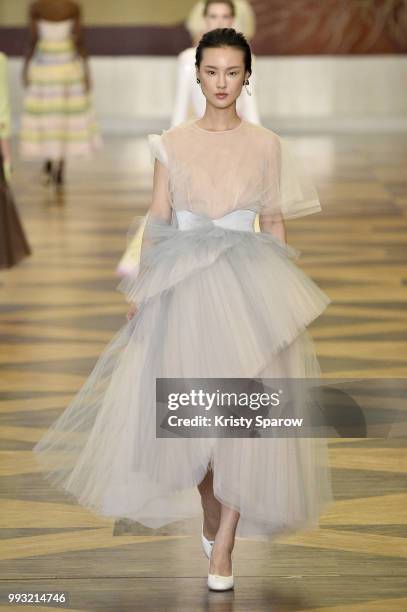 Model walks the runway during the Ulyana Sergeenko Haute Couture Fall Winter 2018/2019 show as part of Paris Fashion Week on July 3, 2018 in Paris,...