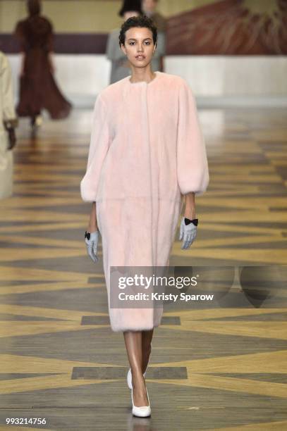 Model walks the runway during the Ulyana Sergeenko Haute Couture Fall Winter 2018/2019 show as part of Paris Fashion Week on July 3, 2018 in Paris,...