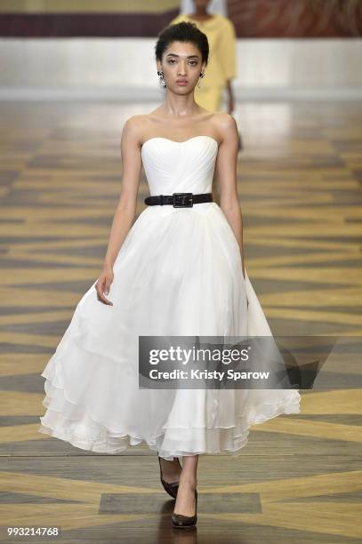 Model walks the runway during the Ulyana Sergeenko Haute Couture Fall Winter 2018/2019 show as part of Paris Fashion Week on July 3, 2018 in Paris,...