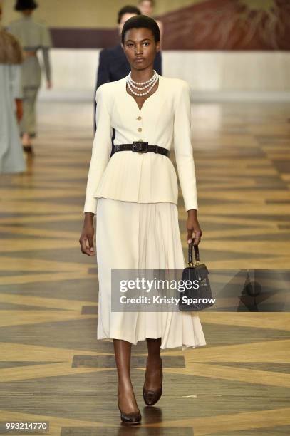 Model walks the runway during the Ulyana Sergeenko Haute Couture Fall Winter 2018/2019 show as part of Paris Fashion Week on July 3, 2018 in Paris,...