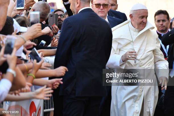 Pope Francis arrives after his mass at the 'Rotonda' on the Lungomare of Bari, to meet with other religious leaders at the Pontifical Basilica of St...