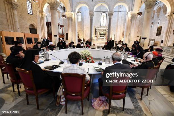 Pope Francis meets with religious leaders at the Pontifical Basilica of St Nicholas in Bari, in the Apulia region in south Italy, on July 7, 2018. -...