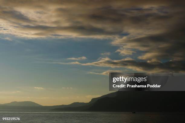 sunset at villarrica lake, pucon, chile - pucon stock pictures, royalty-free photos & images