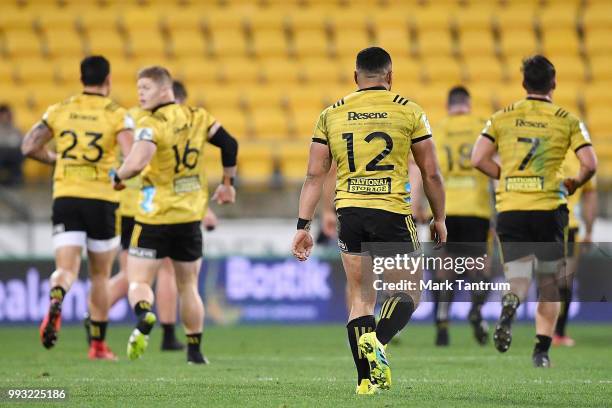 Ngani Laumape of the Hurricanes walks back after scoring during the round 18 Super Rugby match between the Hurricanes and the Blues at Westpac...