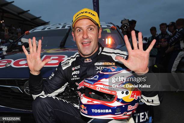 Jamie Whincup driver of the Red Bull Holden Racing Team Holden Commodore ZB celebrates after winning race 17 for the Supercars Townsville 400 on July...