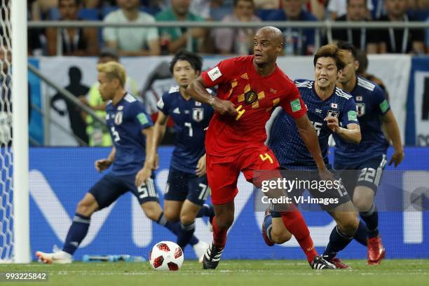 Gaku Shibasaki of Japan, Vincent Kompany of Belgium, Yuya Osako of Japan during the 2018 FIFA World Cup Russia round of 16 match between Belgium and...