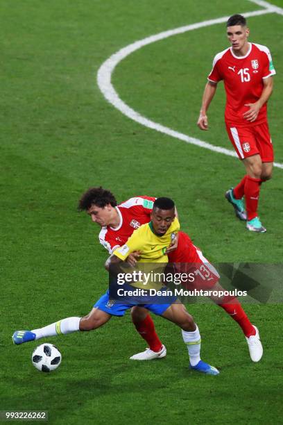 Gabriel Jesus of Brazil battles for the ball with Milos Veljkovic of Serbia during the 2018 FIFA World Cup Russia group E match between Serbia and...