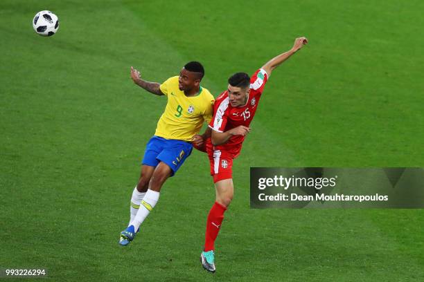 Gabriel Jesus of Brazil battles for the ball with Nikola Milenkovic of Serbia during the 2018 FIFA World Cup Russia group E match between Serbia and...