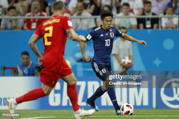 Toby Alderweireld of Belgium, Shinji Kagawa of Japan during the 2018 FIFA World Cup Russia round of 16 match between Belgium and Japan at the Rostov...