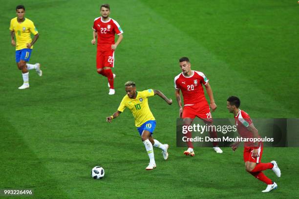 Neymar of Brazil gets past the tackle from Sergej Milinkovic-Savic of Serbia during the 2018 FIFA World Cup Russia group E match between Serbia and...