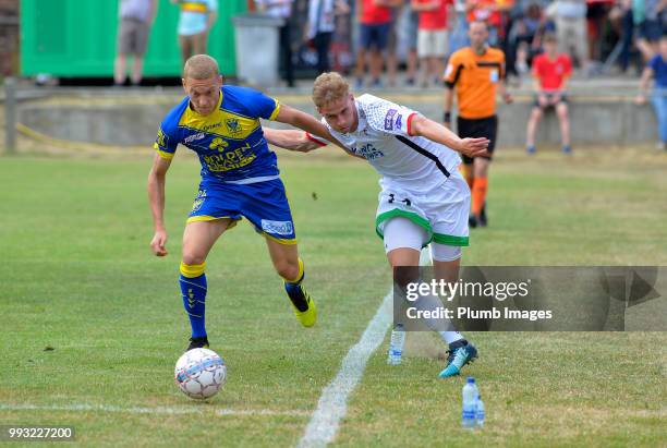 Olivier Myny of OH Leuven with Casper De Norre during the game between OH Leuven and Sint-Truiden : Pre-Season Friendly at VK Linden Stadium on July...