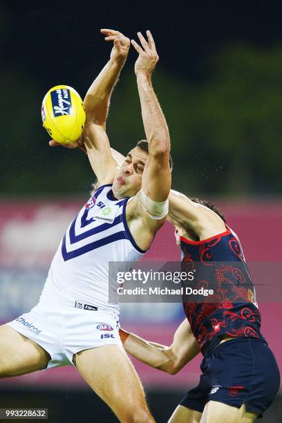 From Stephen Hill of the Dockers competes for the ball during the round 16 AFL match between the Melbourne Demons and the Fremantle Dockers at TIO...