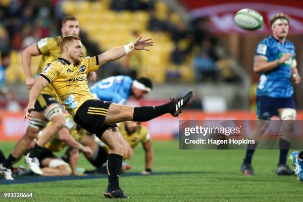 Ihaia West of the Hurricanes kicks during the round 18 Super Rugby match between the Hurricanes and the Blues at Westpac Stadium on July 7, 2018 in...