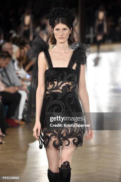 Model walks the runway during the Yanina Couture Haute Couture Fall Winter 2018/2019 show as part of Paris Fashion Week on July 3, 2018 in Paris,...