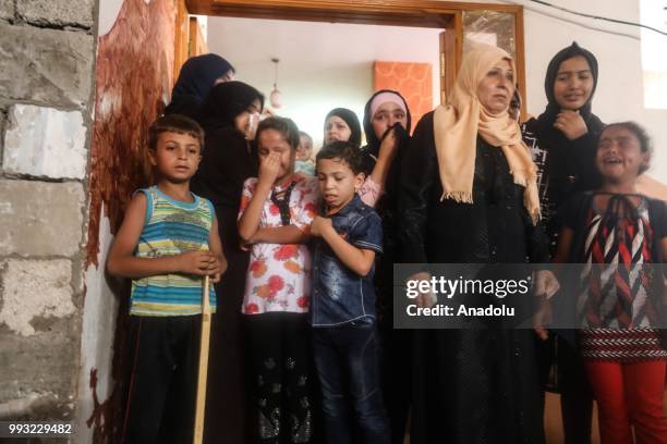 Relatives of 22 years old Mohammed Jamal Abu Halima gesture during his funeral ceremony at Shujaiyya neighbourhood of Gaza City, Gaza on July 7,...