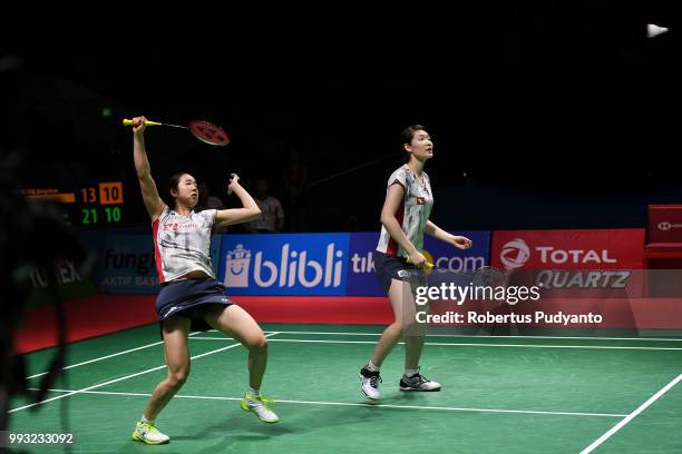 Mayu Matsumoto and Wakana Nagahara of Japan compete against Chen Qingchen and Jia Yifan of China during the Women's Doubles Semi-final match on day...