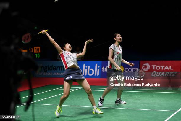 Mayu Matsumoto and Wakana Nagahara of Japan compete against Chen Qingchen and Jia Yifan of China during the Women's Doubles Semi-final match on day...