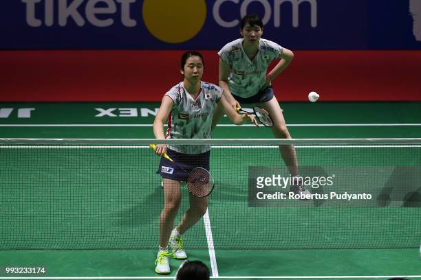 Mayu Matsumoto and Wakana Nagahara of Japan compete against Chen Qingchen and Jia Yifan of China during the Women's Doubles Semi-final match on day...
