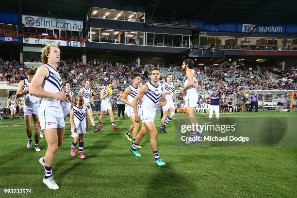 Stephen Hill of the Dockers walks out for his 2ooth match during the round 16 AFL match between the Melbourne Demons and the Fremantle Dockers at TIO...