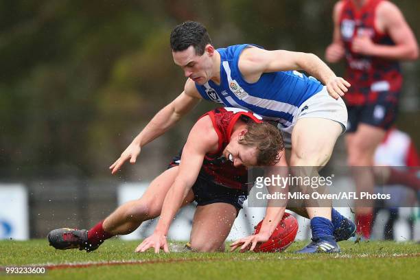 Patrick Mckenna of the Demons is tackled during the round 14 VFL match between Casey and North Melbourne at Casey Fields on July 7, 2018 in...