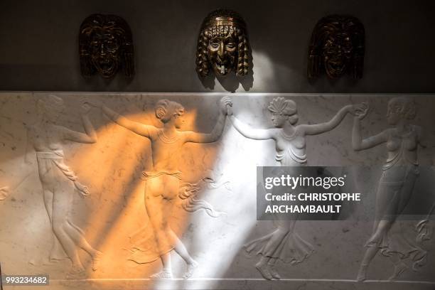 This picture shows a bas-relief in the dining-room of the newly-refurbished Lutetia Hotel in Paris on July 6, 2018. - The iconic, history steeped...