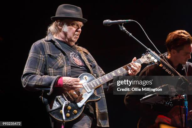 Neil Young performs onstage headlining the mainstage at The Plains of Abraham in The Battlefields Park during day 2 of the 51st Festival d'ete de...