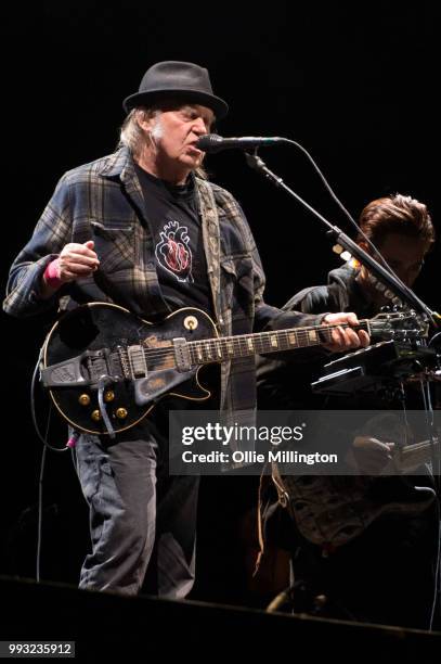 Neil Young performs onstage headlining the mainstage at The Plains of Abraham in The Battlefields Park during day 2 of the 51st Festival d'ete de...