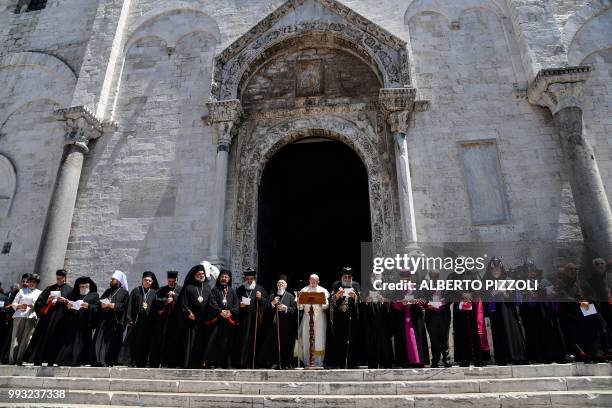 Pope Francis delivers his speech next to Ecumenic Patriarch of the Orthodox Church Bartolomeo I , Egypt's Coptic Orthodox Pope Tawadros II and other...