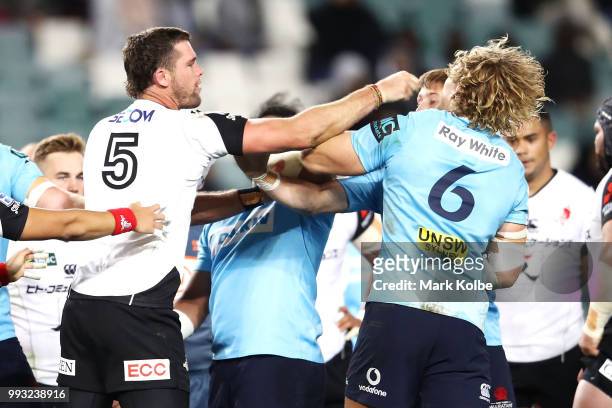 Grant Hattingh of the Sunwolves and Ned Hanigan of the Waratahs exchange heated words during the round 18 Super Rugby match between the Waratahs and...