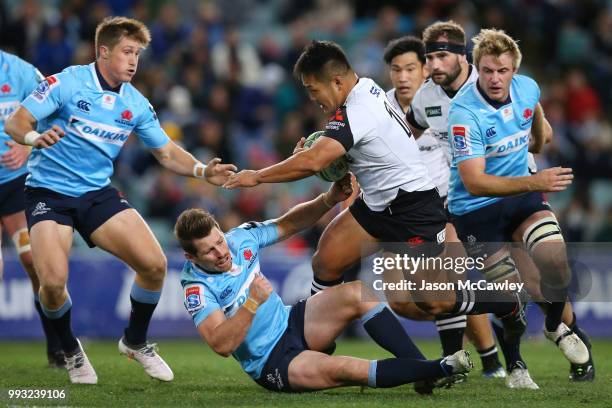 Yusuke Niwai of the Sunwolves makes a break during the round 18 Super Rugby match between the Waratahs and the Sunwolves at Allianz Stadium on July...