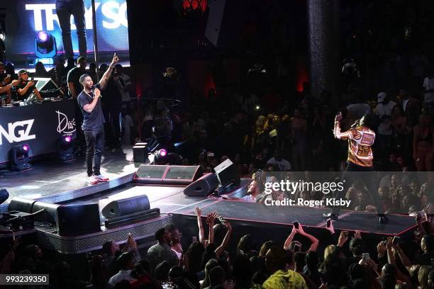 Actor/comedian Kevin Hart and recording artist Trey Songz perform onstage at Hart's birthday party at Drai's Beach Club - Nightclub at The Cromwell...