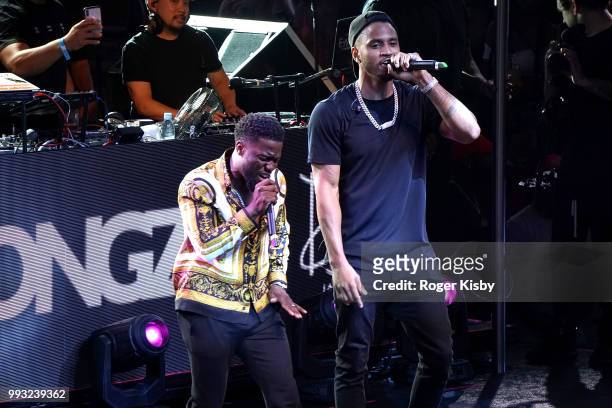 Actor/comedian Kevin Hart and recording artist Trey Songz perform onstage at Hart's birthday party at Drai's Beach Club - Nightclub at The Cromwell...